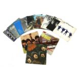 A collection of The Beatles vinyl records and ephemera,