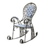 *The 'Peacock' iron rocking chair,