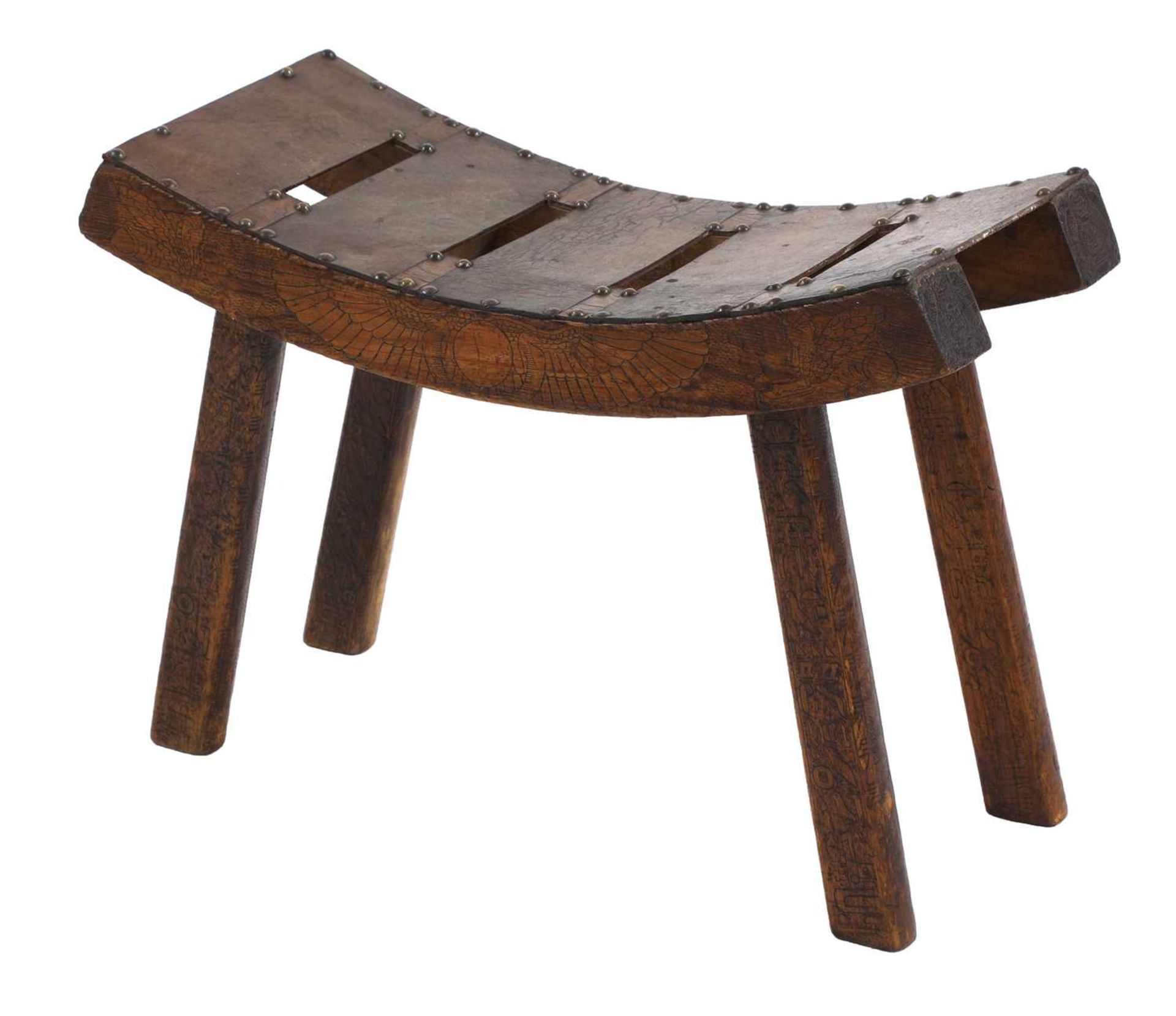 An Arts and Crafts 'Egyptian' pine stool,