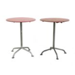 A pair of Bigla bistro tables,