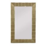 A modernist-style wall mirror,