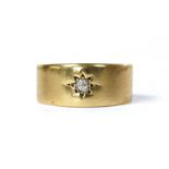 An 18ct gold star set diamond ring,