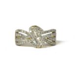 A 9ct gold diamond set knot design ring