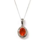 A white gold fire opal and diamond cluster pendant,