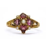 A Victorian 15ct gold garnet and split pearl ring,