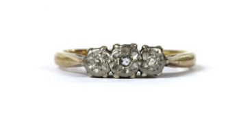 A 9ct gold three stone diamond ring,