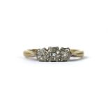 A 9ct gold three stone diamond ring,