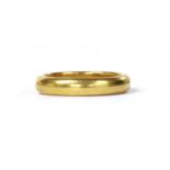 A 22ct gold 'D' section wedding ring,