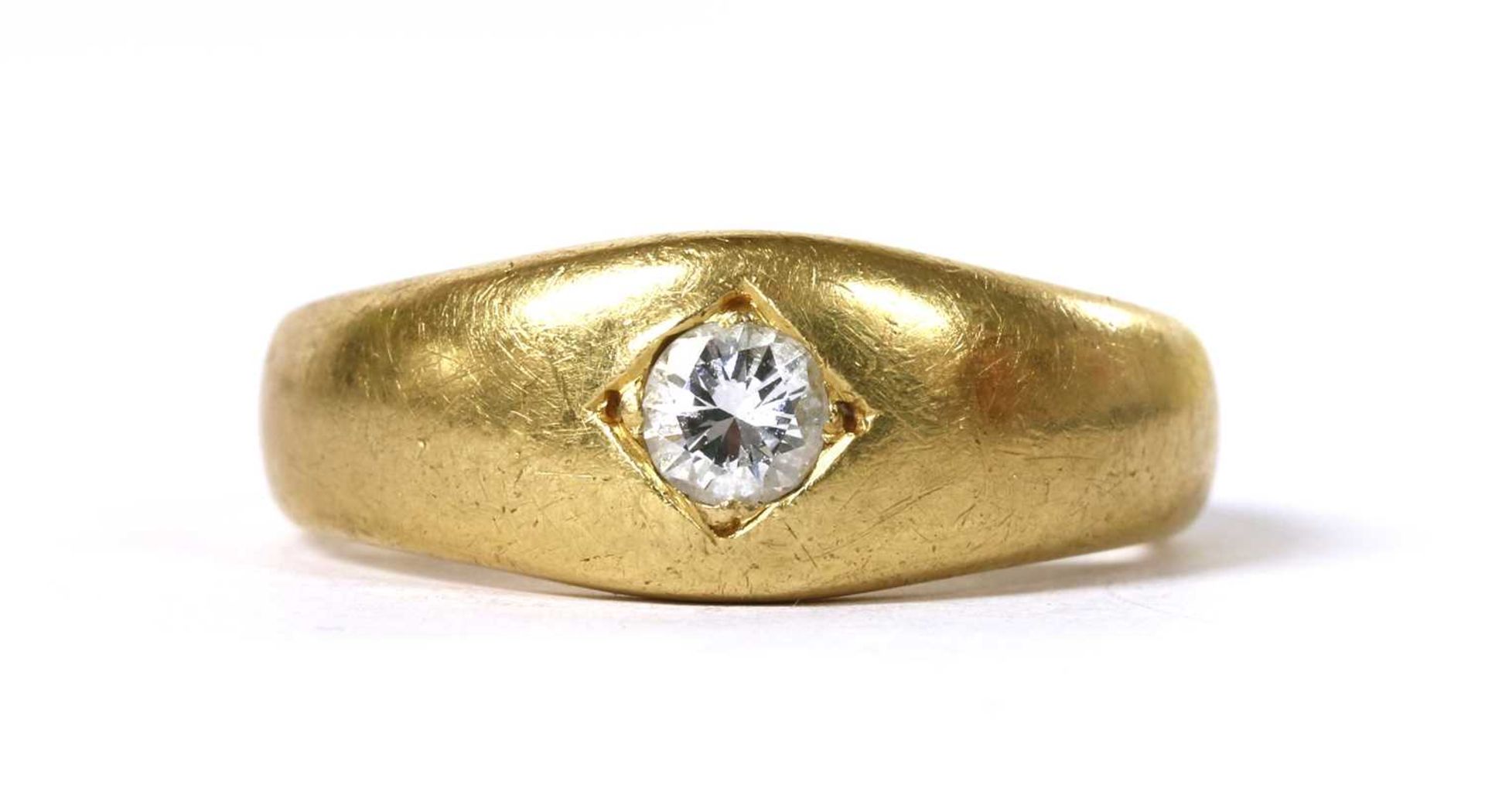 An 18ct gold diamond set ring,