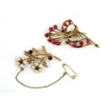 Two gold spray brooches,