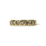 A gold seven stone diamond ring,