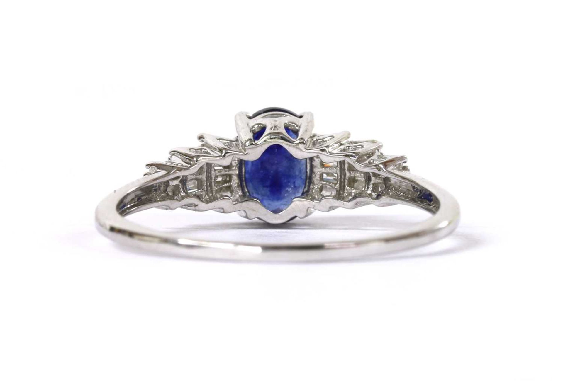 A white gold fracture filled sapphire and diamond ring, - Image 3 of 3