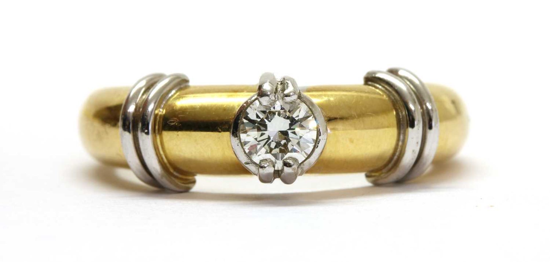 An 18ct gold single stone diamond ring,