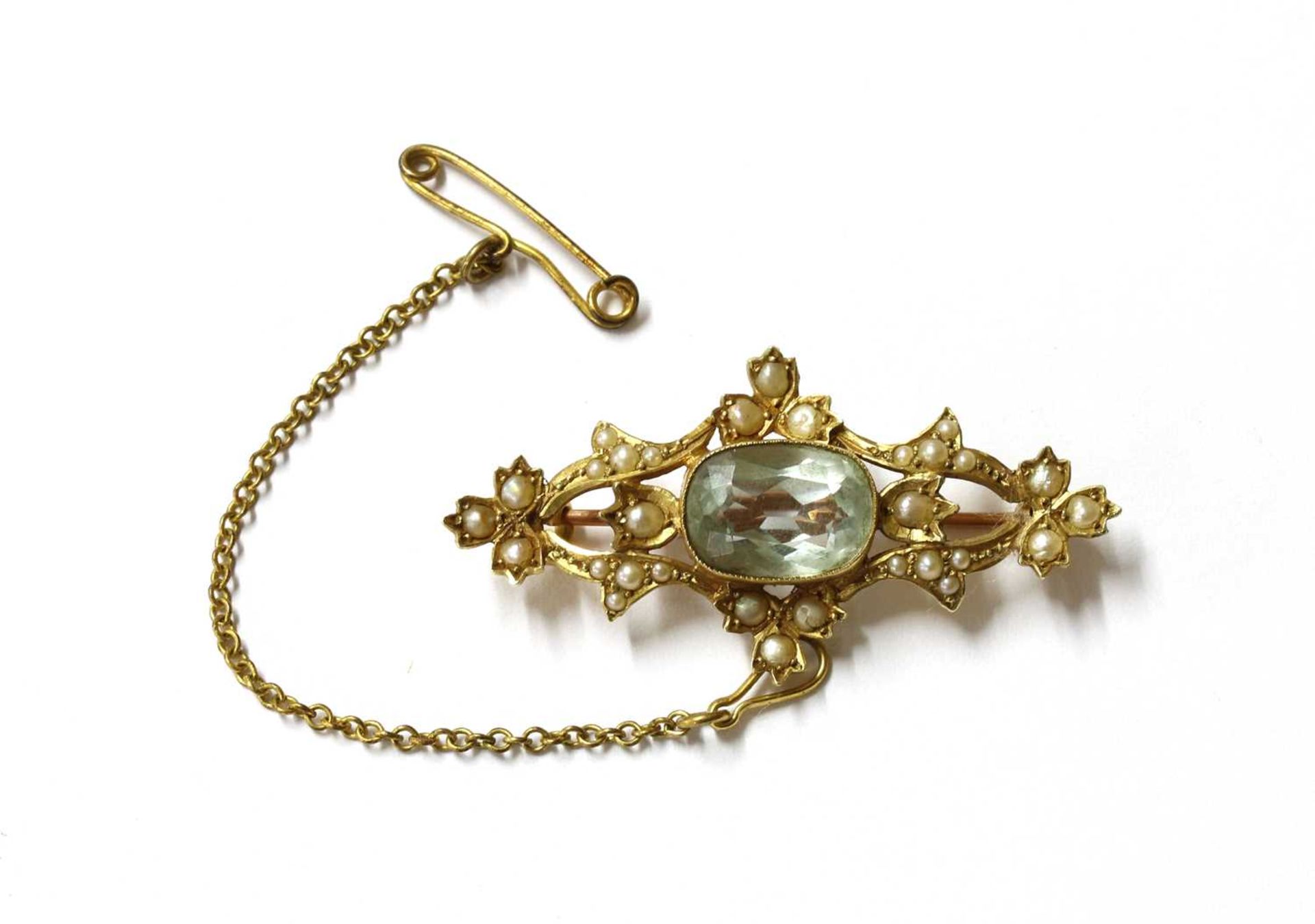 An Edwardian gold aquamarine and split pearl brooch,