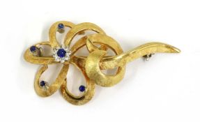 A gold synthetic sapphire and paste set spray brooch,