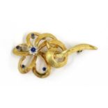 A gold synthetic sapphire and paste set spray brooch,