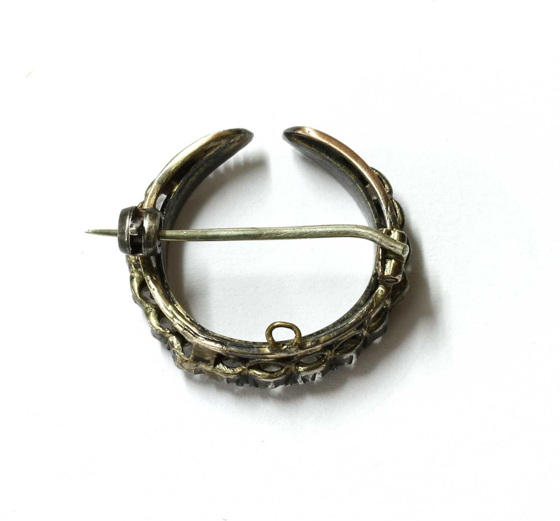 A silver and gold, diamond crescent brooch, - Image 2 of 2