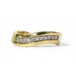 An 18ct gold diamond ring,