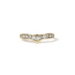 A gold diamond wishbone-shaped half eternity ring,