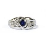 A white gold sapphire and diamond ring,