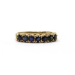 A 9ct gold sapphire set half eternity ring,