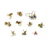 A quantity of gold earrings,