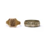 A gold signet ring,