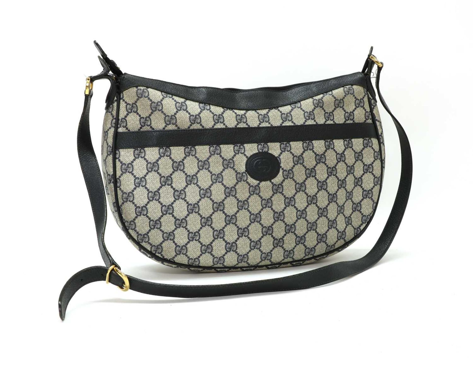 A Gucci blue leather and coated canvas shoulder bag,