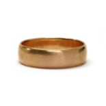 A gold wedding ring,
