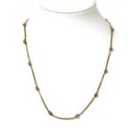 A 9ct gold box link and bead chain,