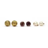 Three pairs of gold earrings,