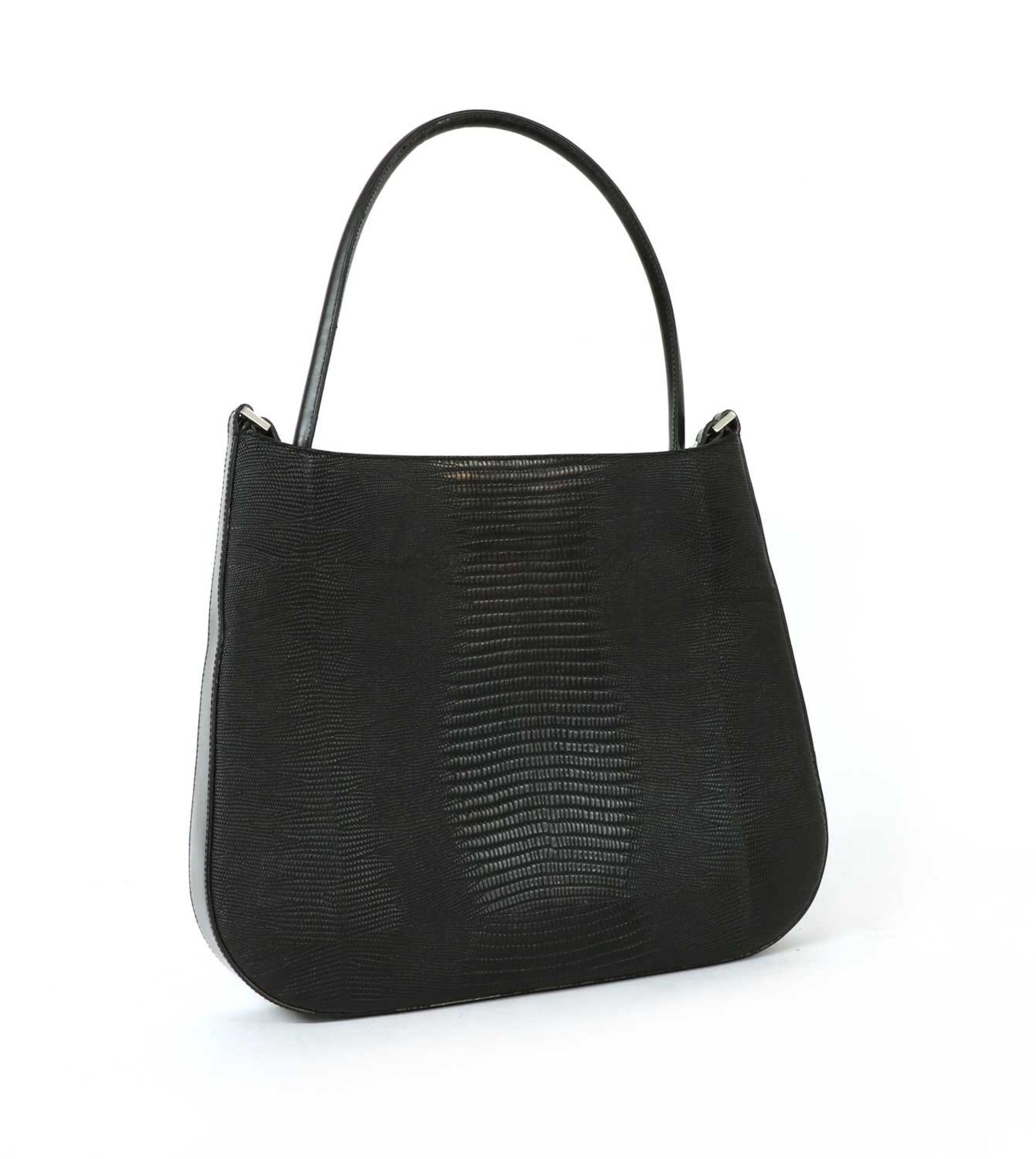 A vintage Salvatore Ferragamo black lizard skin tote bag