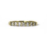 An 18ct gold diamond half eternity ring,