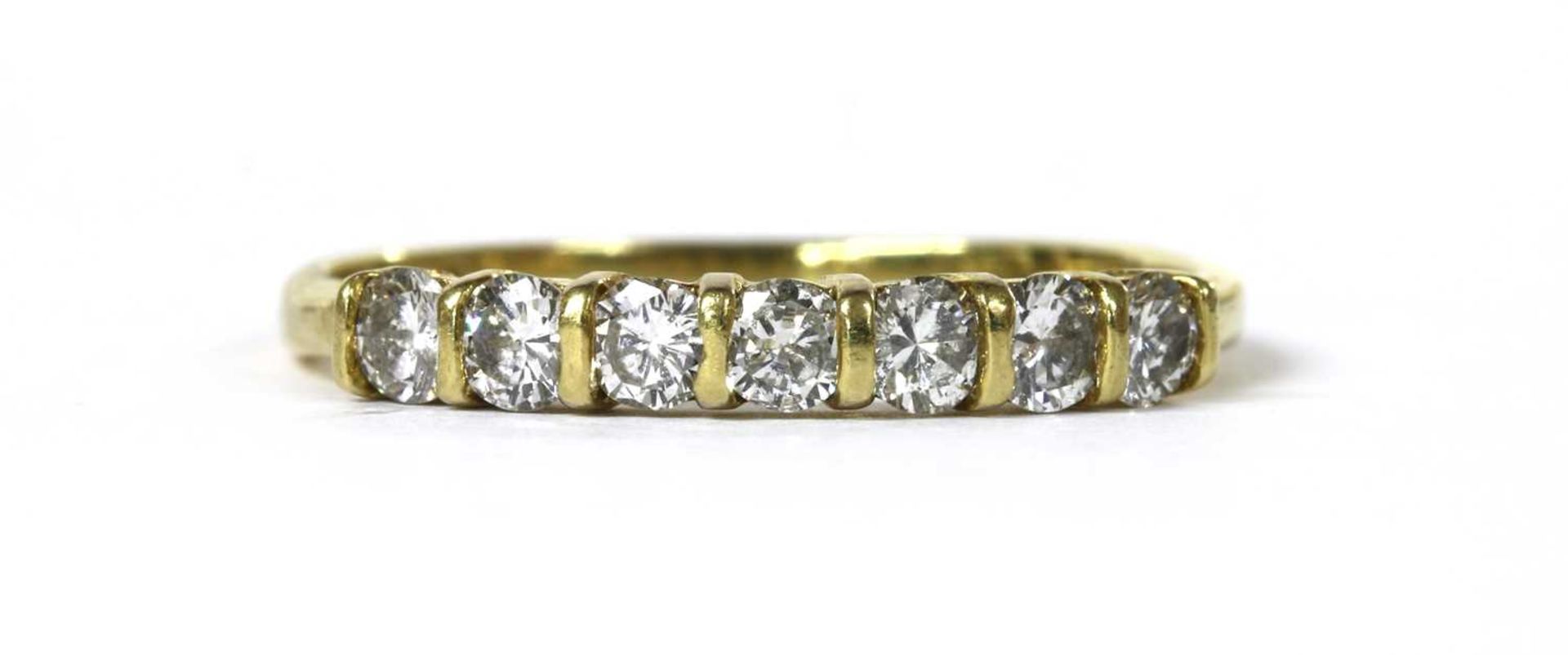 An 18ct gold diamond half eternity ring,