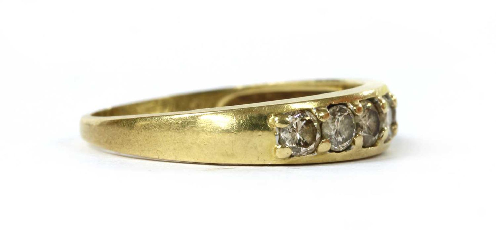 A gold seven stone diamond ring, - Image 2 of 3