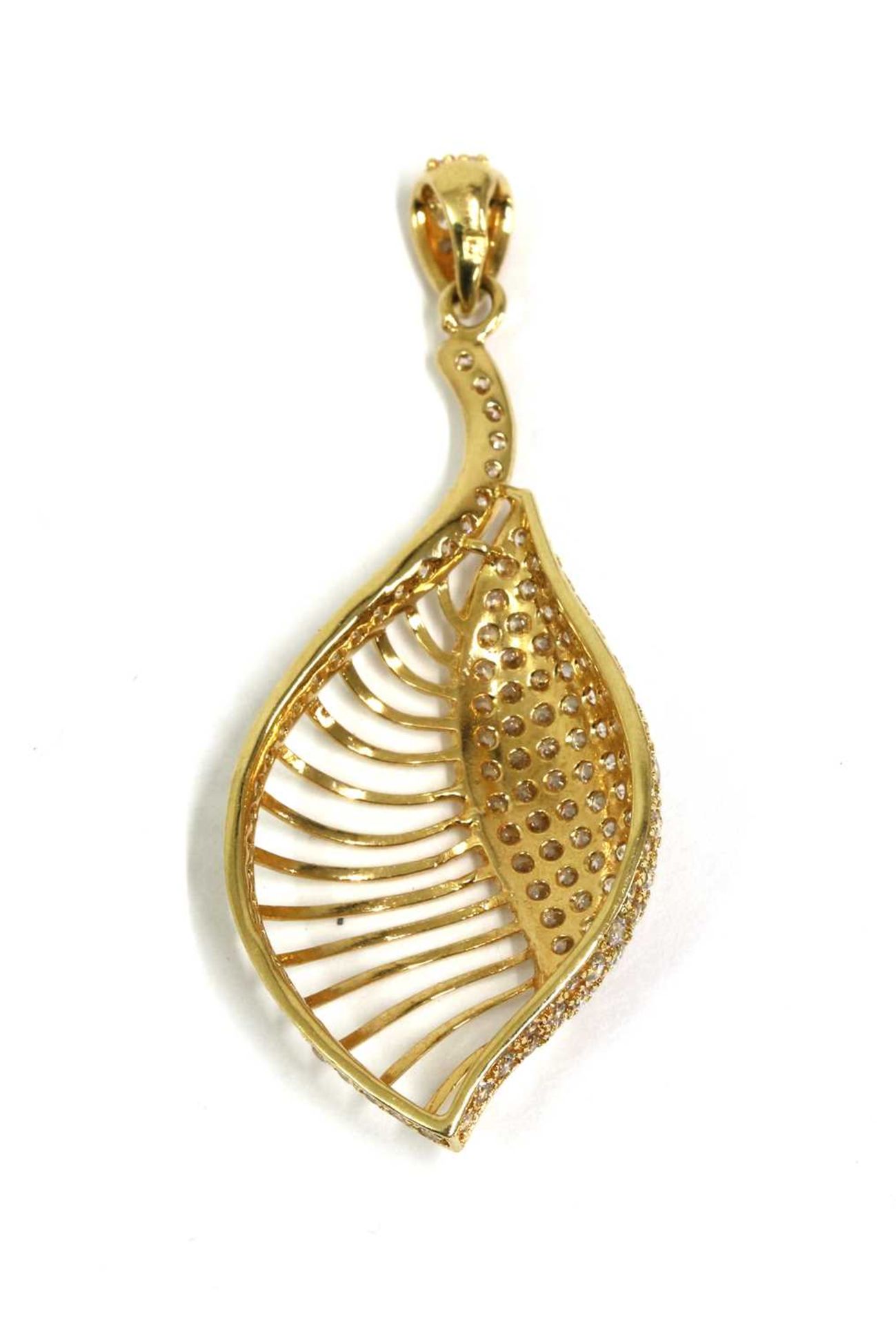 A gold cubic zirconia set shell or leaf form pendant, - Image 2 of 2