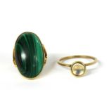 A gold single stone malachite ring,