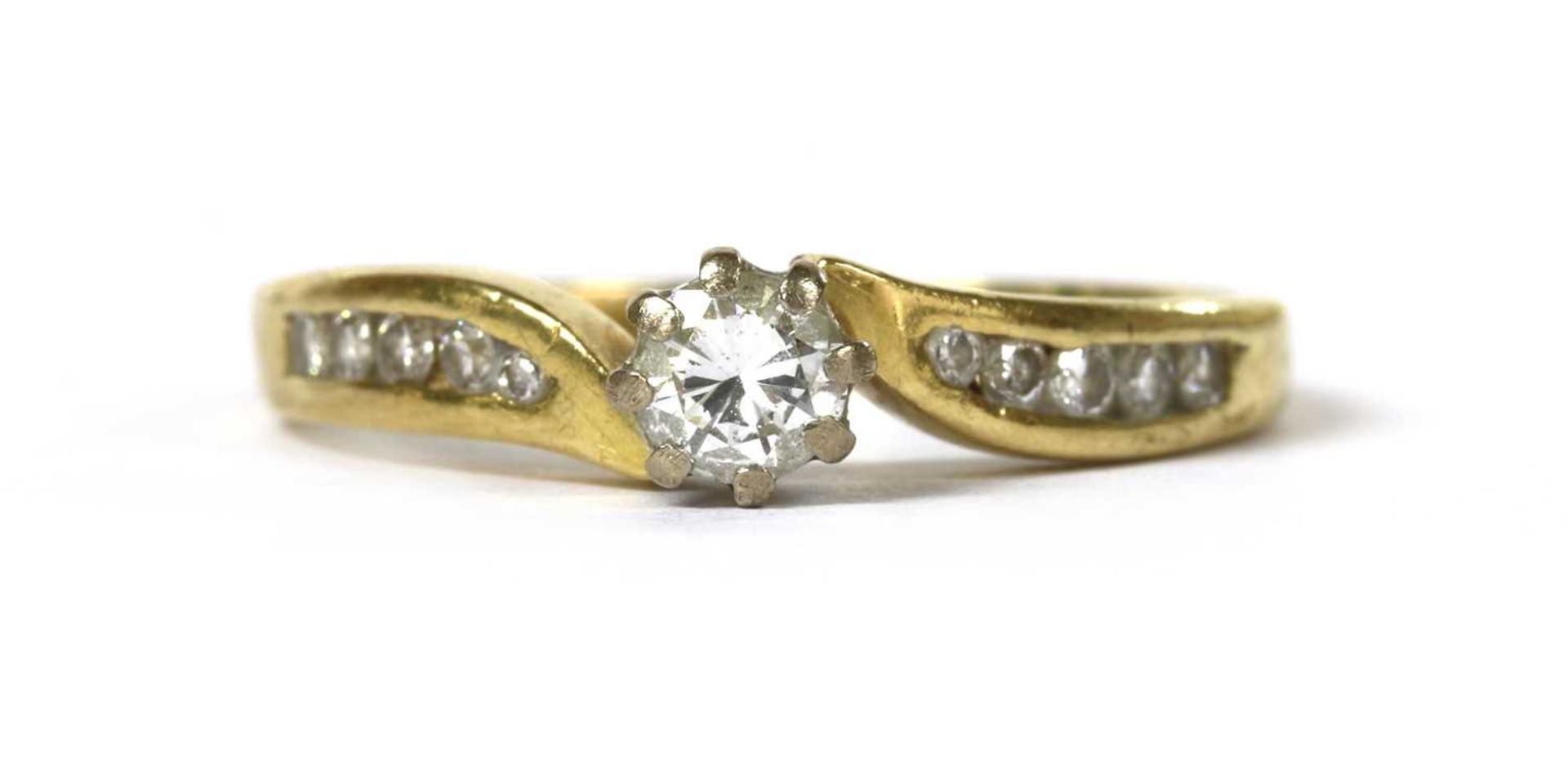 An 18ct gold diamond ring,