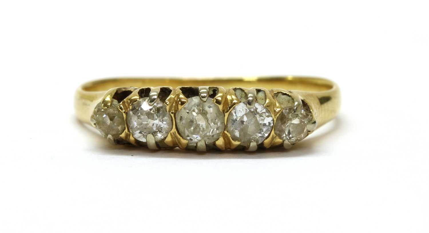 An 18ct gold five stone diamond ring,