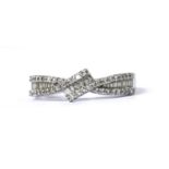 An 18ct white gold diamond crossover ring,