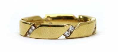 An 18ct gold diamond set band ring,