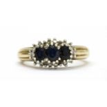 A 9ct gold sapphire and diamond triple cluster ring,