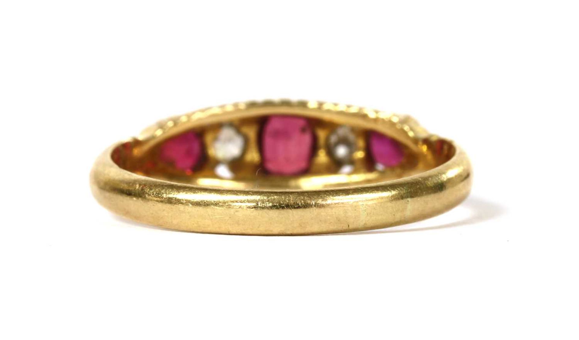 An 18ct gold ruby and diamond five stone ring, - Image 3 of 3