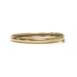 A gold bangle,