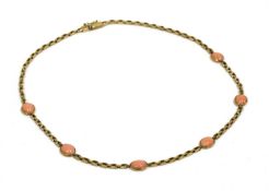 A 9ct gold coral necklace,