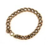 A gold hollow curb link bracelet,