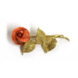 An Italian gold carved coral brooch,