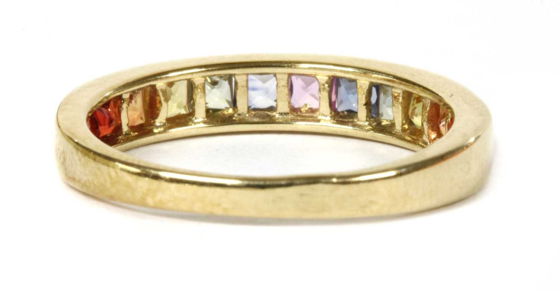 A gold rainbow sapphire half eternity ring, - Image 2 of 2