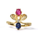 A gold ruby, sapphire and diamond ring,