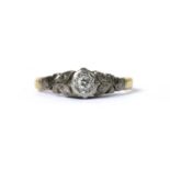 A gold single stone diamond ring,